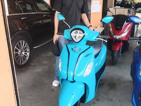 Customer riding rental bike in Prachuap Khiri Khan